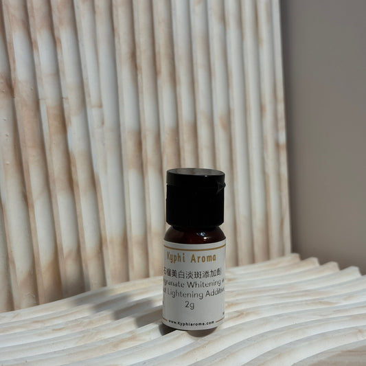 Pomegranate whitening and spot-fading additives